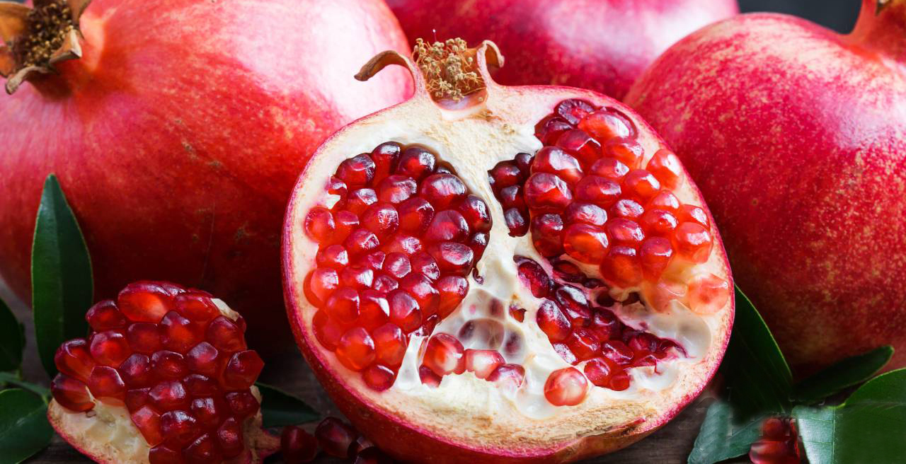 A pomegranate is a sweet, tart fruit with thick, red skin.